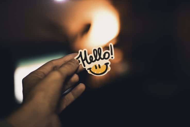 Hello smiley face badge
