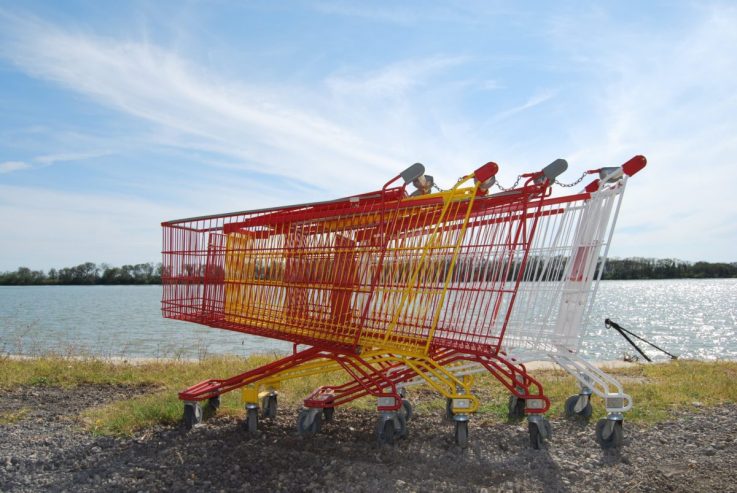 Red, white and yellow shopping trolleys 