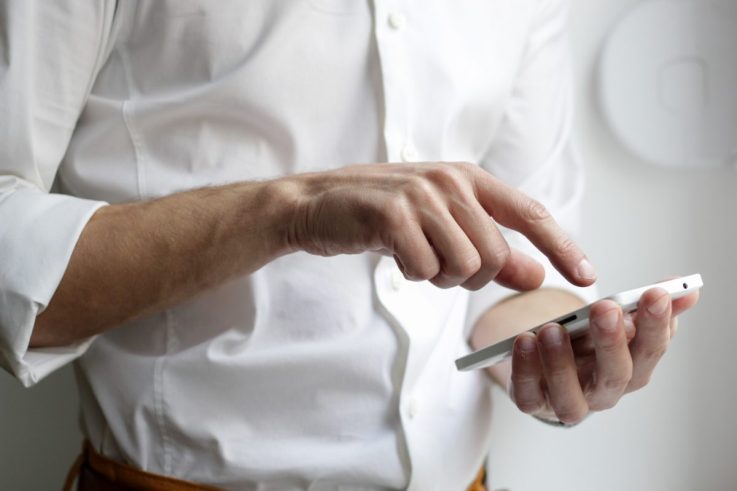 Omnichannel - Man shopping on mobile phone 